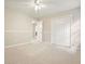Bedroom with a large closet for storage, fresh carpeting, and neutral paint at 3267 Standing Peachtree Trl, Kennesaw, GA 30152