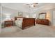 Spacious main bedroom with carpet floors, tray ceiling and ample natural light at 3267 Standing Peachtree Trl, Kennesaw, GA 30152