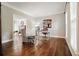 Office with hardwood floors, large window, and a view to the living room at 3267 Standing Peachtree Trl, Kennesaw, GA 30152
