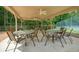 Outdoor seating area with tables and chairs under a covered pavilion, ideal for gatherings and enjoying the fresh air at 3267 Standing Peachtree Trl, Kennesaw, GA 30152