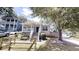 Charming home with inviting front porch, fresh paint, and well-manicured landscaping at 71 Thayer Se Ave, Atlanta, GA 30315