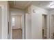 Hallway featuring neutral walls, carpet flooring, and doorways to other rooms at 71 Thayer Se Ave, Atlanta, GA 30315