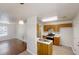 Open kitchen design features stainless steel appliances, wood cabinets, and adjacent eating area at 71 Thayer Se Ave, Atlanta, GA 30315