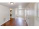 Inviting living room with hardwood floors seamlessly connecting to an adjacent kitchen space at 71 Thayer Se Ave, Atlanta, GA 30315