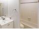 Clean bathroom featuring a shower and tub combination and a white sink vanity at 1169 Oaks Pl, Stone Mountain, GA 30083