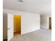 Spacious bedroom featuring plush carpeting and a large closet at 1169 Oaks Pl, Stone Mountain, GA 30083