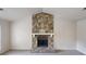 Living room featuring a stunning stone fireplace with white mantle, creating a cozy focal point at 1169 Oaks Pl, Stone Mountain, GA 30083