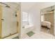 The ensuite bathroom offers tub, shower, and direct bedroom access at 2895 Dominion Walk Ln, Snellville, GA 30078