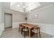 Dining room featuring a wood table, seating, gray walls, and white trim at 2895 Dominion Walk Ln, Snellville, GA 30078