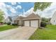Charming brick home with a two-car garage and well-maintained landscaping at 2895 Dominion Walk Ln, Snellville, GA 30078