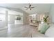 Open concept living area connects kitchen, dining, and living rooms at 2895 Dominion Walk Ln, Snellville, GA 30078
