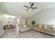 Open concept living room and dining area with plenty of natural light at 2895 Dominion Walk Ln, Snellville, GA 30078
