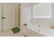 This bathroom offers a soaking tub and glass shower at 2895 Dominion Walk Ln, Snellville, GA 30078
