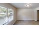 Bedroom with a large window and a partial view of the closet at 366 O Brian Dr, Stone Mountain, GA 30088