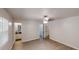 Bedroom with ceiling fan and hardwood floors, leading to an ensuite bathroom at 366 O Brian Dr, Stone Mountain, GA 30088