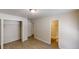 Bedroom featuring an open closet and view into a bathroom with toilet at 366 O Brian Dr, Stone Mountain, GA 30088