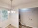Eat in kitchen nook with natural light, new flooring, and access to laundry area at 366 O Brian Dr, Stone Mountain, GA 30088