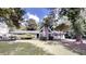 Charming single story home with mature trees, a stone chimney and a well manicured lawn at 366 O Brian Dr, Stone Mountain, GA 30088
