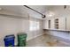 Garage with storage shelves, utility bins, concrete flooring, and a window providing natural light at 366 O Brian Dr, Stone Mountain, GA 30088