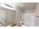 Bathroom features a granite vanity top, framed mirror, and shower-tub combination at 488 Barclay Ct, Stone Mountain, GA 30083