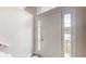 Bright foyer with a classic white front door, sidelights, and transom window at 488 Barclay Ct, Stone Mountain, GA 30083