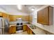 Well-equipped kitchen features stainless steel appliances and granite countertops at 488 Barclay Ct, Stone Mountain, GA 30083