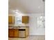 Well-lit kitchen with granite countertops and stainless steel appliances at 488 Barclay Ct, Stone Mountain, GA 30083