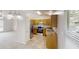 Eat-in kitchen with stainless steel appliances and adjacent living area at 488 Barclay Ct, Stone Mountain, GA 30083