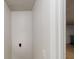Utility room entrance near basement staircase with storage at 488 Barclay Ct, Stone Mountain, GA 30083