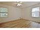 Bedroom with hardwood floors, windows and ceiling fan at 501 Bridlepath Ln, Peachtree City, GA 30269