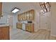 Spacious kitchen with ample cabinet space, stainless steel sink, and breakfast area access at 501 Bridlepath Ln, Peachtree City, GA 30269