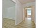 Open living space with light wood flooring and neutral paint, creating a bright and airy atmosphere at 501 Bridlepath Ln, Peachtree City, GA 30269