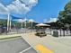A covered picnic table sits near the community splash pad with multiple water features at 501 Bridlepath Ln, Peachtree City, GA 30269