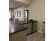 Basement bar with countertop and mini-fridge, next to a pool table at 605 Meadows Creek Dr, Johns Creek, GA 30005