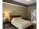 A serene bedroom with neutral tones, offering a view to the ensuite bathroom for added convenience at 605 Meadows Creek Dr, Johns Creek, GA 30005