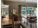 Open-concept living space with hardwood floors, natural light, and access to the backyard deck at 605 Meadows Creek Dr, Johns Creek, GA 30005