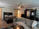 Spacious bedroom and sitting area including ceiling fan and an accent wall at 6174 S. Skyline Dr, Douglasville, GA 30135