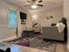 Comfortable living room with plush seating, natural light, and a stylish rug at 6174 S. Skyline Dr, Douglasville, GA 30135
