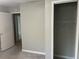 Bedroom with closet and doorways at 1701 Charmeth Rd, Lithonia, GA 30058