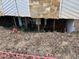View of home's compromised crawlspace showing needed foundation repair at 1701 Charmeth Rd, Lithonia, GA 30058