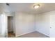 A bedroom featuring carpet floors, a ceiling light and a closet for storage at 364 Springhaven Way, Lawrenceville, GA 30046