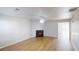 Bright living room featuring a fireplace and hardwood flooring at 364 Springhaven Way, Lawrenceville, GA 30046