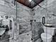 Bathroom showcasing a glass-enclosed shower, toilet, and tub at 4271 Edgewater Drive Northwest Nw Dr, Kennesaw, GA 30144