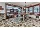 Open-concept living room with hardwood floors flowing into the dining and breakfast nook at 4271 Edgewater Drive Northwest Nw Dr, Kennesaw, GA 30144
