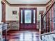 Inviting foyer with detailed front door, hardwood flooring, and staircase at 4271 Edgewater Drive Northwest Nw Dr, Kennesaw, GA 30144