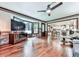 Open-concept living room with hardwood floors flowing into the dining area and kitchen at 4271 Edgewater Drive Northwest Nw Dr, Kennesaw, GA 30144