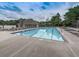 Large community pool with multiple lounge chairs and tables available for residents at 4271 Edgewater Drive Northwest Nw Dr, Kennesaw, GA 30144