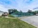 View of neighborhood tennis courts enclosed with green fence and includes covered benches at 4271 Edgewater Drive Northwest Nw Dr, Kennesaw, GA 30144