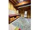 Unfinished basement featuring a large workbench and ample space for storage or customization at 4715 Scotney Ct, Suwanee, GA 30024