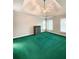Spacious primary bedroom with tray ceilings, ample natural light, and neutral walls at 4715 Scotney Ct, Suwanee, GA 30024